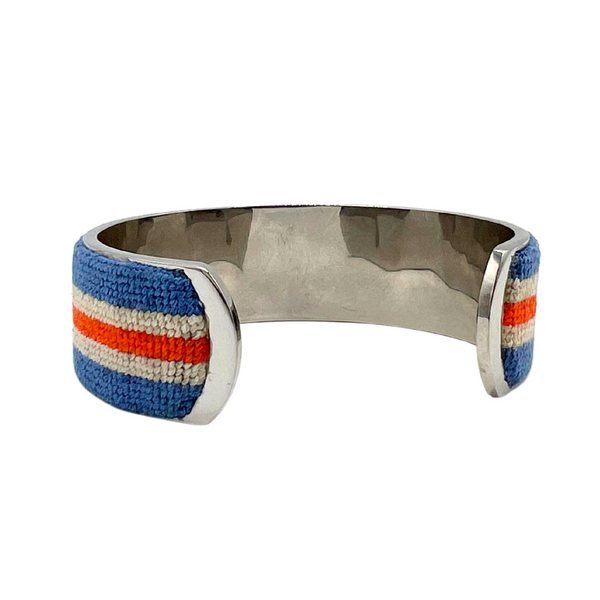 red, white, and blue striped needlepoint cuff over metal