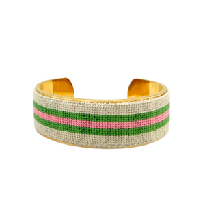 pink and green striped needlepoint cuff over metal