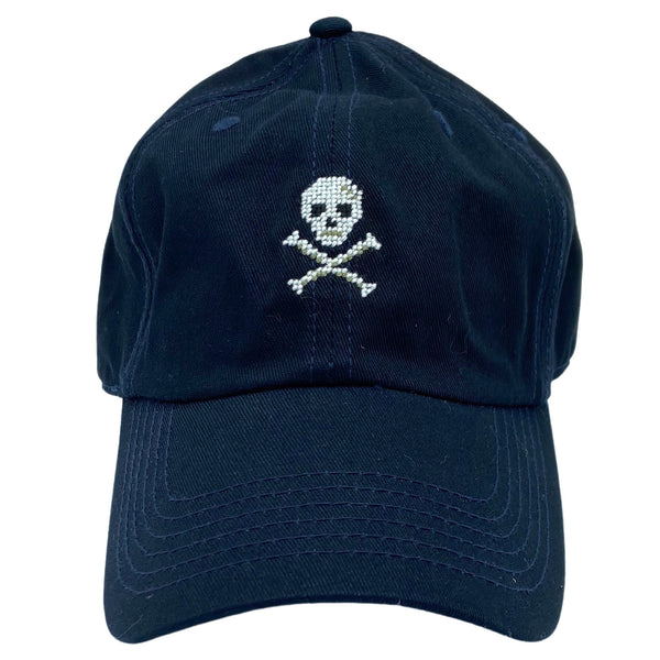 skull and crossbones on midnight blue hat