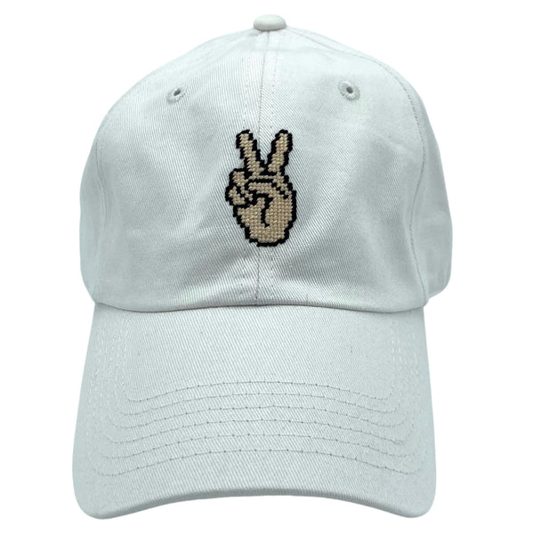 peace sign on snow white hat